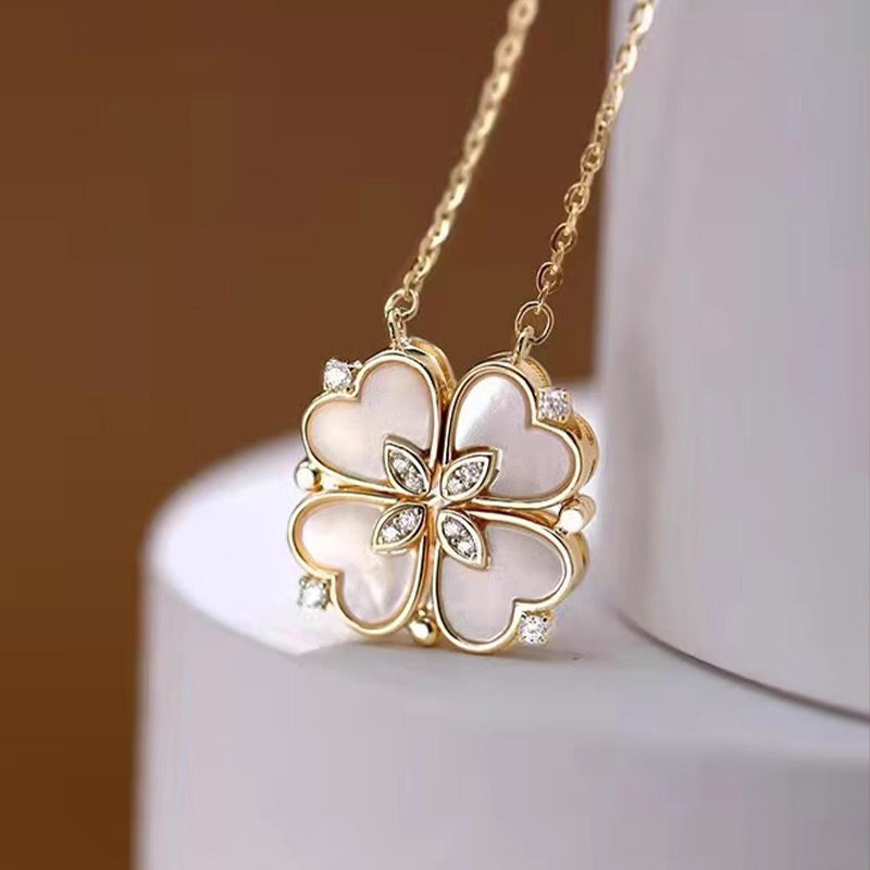 Collar con micro engaste de perlas y circonitas, forma cuarto de concha-ES