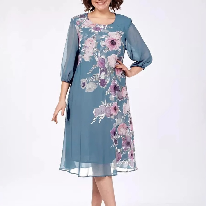 Elegante vestido de gasa con estampado floral y escote redondo.-ES