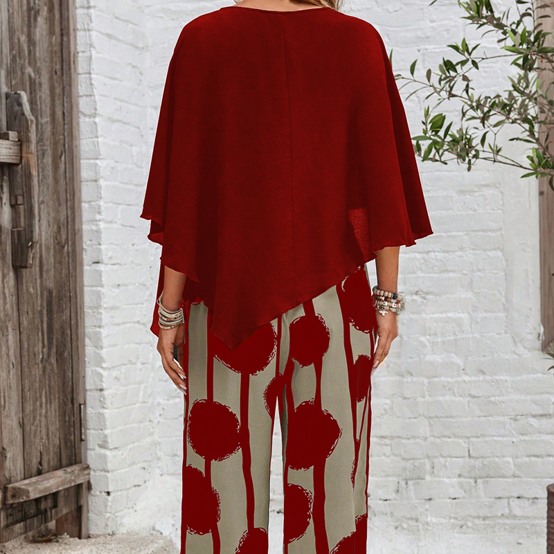 Elegante conjunto con top de manga tres cuartos y pantalón estampado-ES