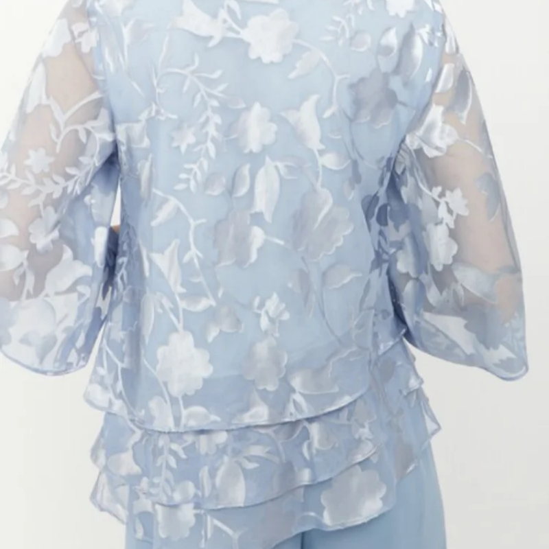 Elegantes tops de mujer con lazos y pantalones anchos en un conjunto.-ES