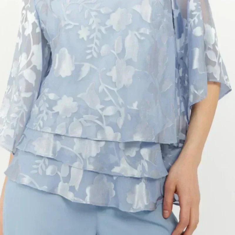 Elegantes tops de mujer con lazos y pantalones anchos en un conjunto.-ES