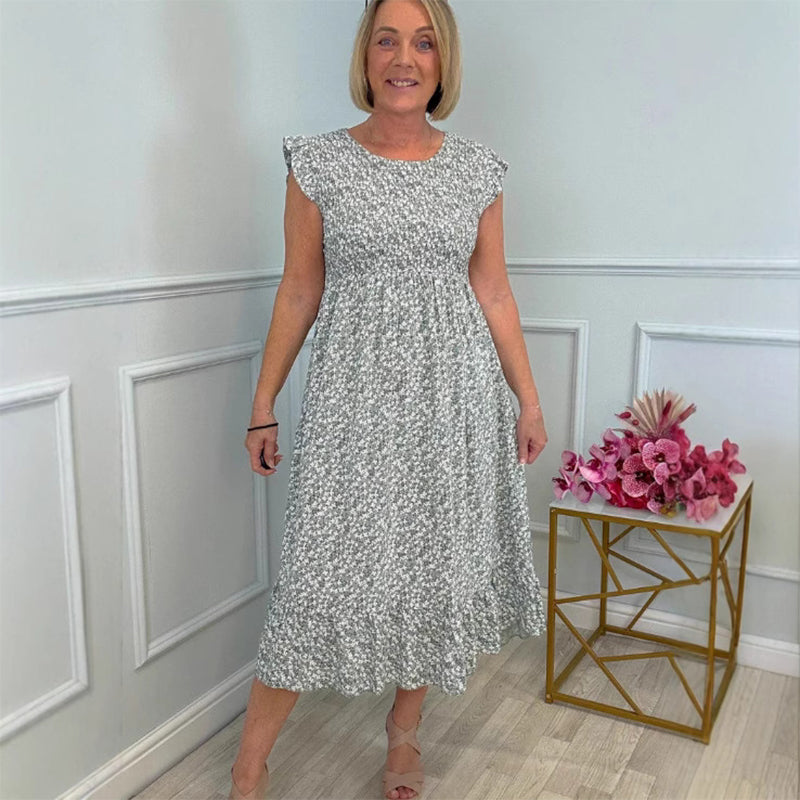 Elegante vestido floral de mujer con cintura alta y volante en la manga.-ES