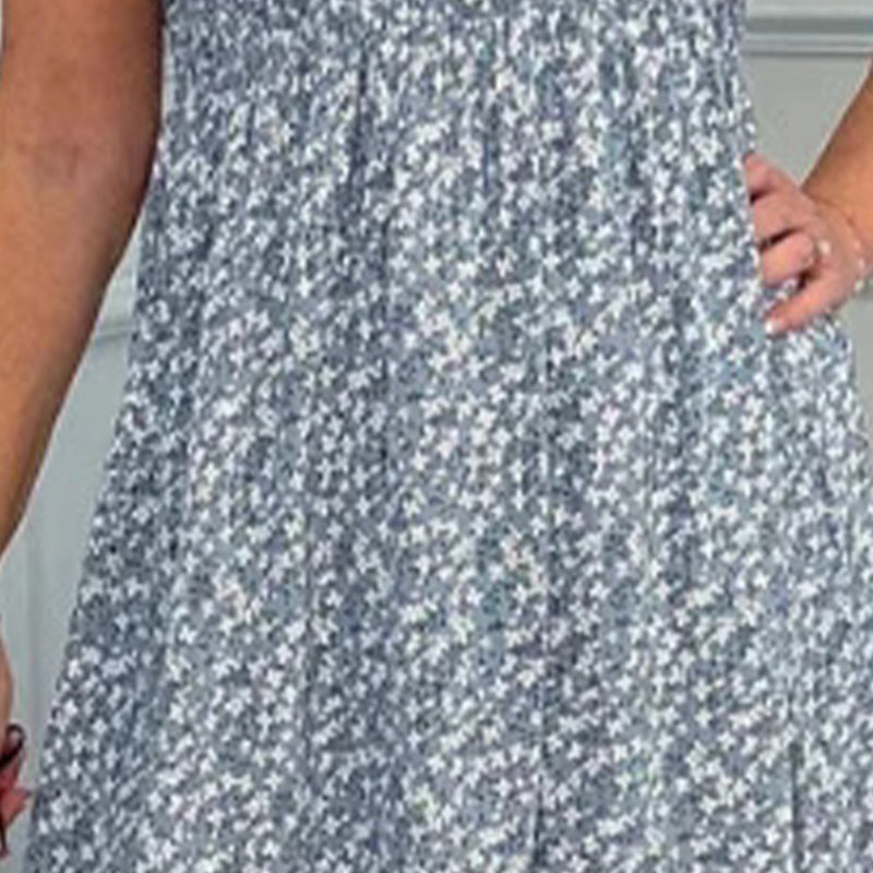 Elegante vestido floral de mujer con cintura alta y volante en la manga.-ES
