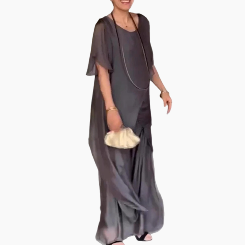 🛍️✨ Ženski komplet, ki ga sestavljata bluza nepravilnega kroja in lahke hlače-SI
