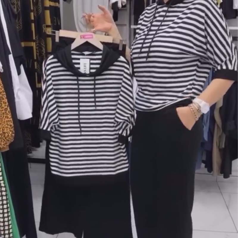 Conjunto de top de rayas y pantalón de color liso para mujer-ES