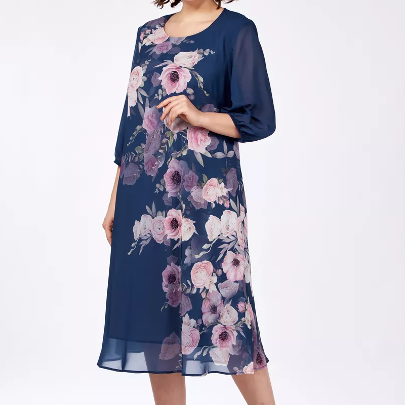 Elegante vestido de gasa con estampado floral y escote redondo.-ES