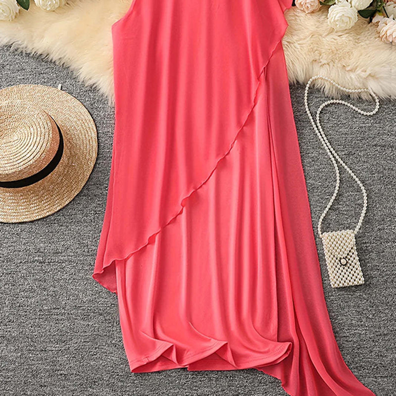 Elegante vestido sin mangas con escote redondo y malla asimétrica.-ES